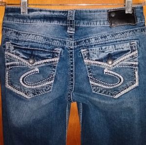 Silver Suki fluid mid-rise boot cut jeans